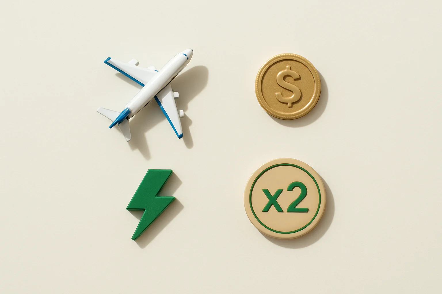 Overhead flat lay with airplane figurine, gold coin, lightning token, multiplier badge